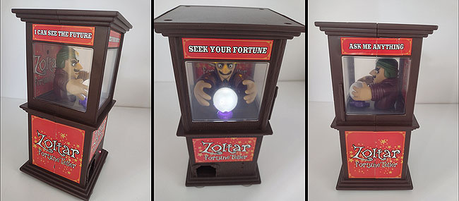 Side and front views of the brown and red cabinet housing Zoltar and his magic crystal ball.