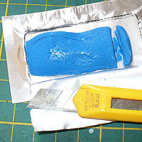 SUGRU opened packet. Blue.