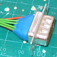 Image of four 3.5mm switch sockets laid out with the wires to attach.